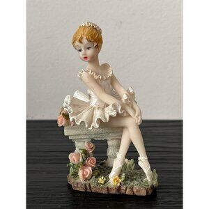 Resin Ballerina Figurine Sitting on Bench Adorned w/Flowers White Tutu Slippers
